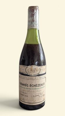 a bottle of wine that is sitting on a table
