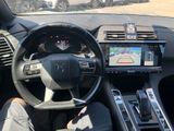 the interior of a car with a steering wheel and a dash board
