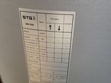 the back of a refrigerator with a sticker on it ' s side