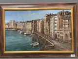 painting of a view of a harbor with boats in the water