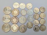 a close up of a bunch of coins on a table