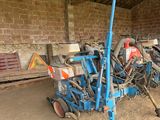 a blue machine that is sitting in a room