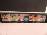 an image of a display case with a variety of miniature figurines in it