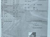 un ticket de caisse sur lequel figure la photo d'un homme