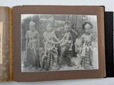 an old photo of a group of people posing for a picture in a book