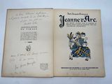 an open book with a drawing of a man sitting on a horse