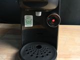 a coffee maker that is sitting on a table