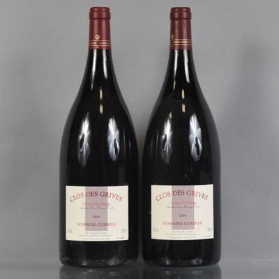 two bottles of red wine sitting next to each other on a table