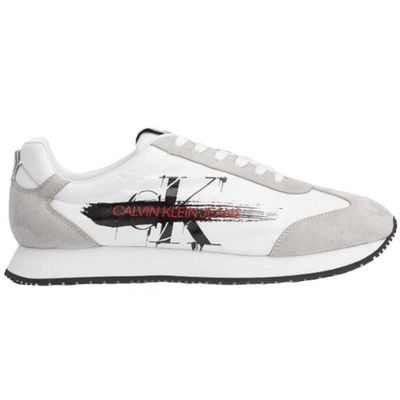a white and grey sneaker with a design on the side