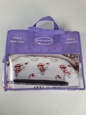 the purple bag is filled with a bedding set and a pillow