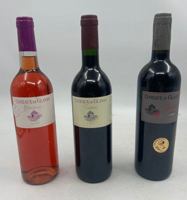 three bottles of wine sitting next to each other on a table