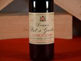 a bottle of wine that is sitting on a table
