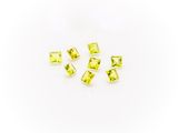 a group of yellow cubicles sitting on top of a white surface