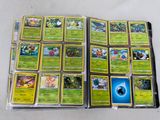 a lot of pokemon cards on the table