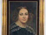 portrait of a woman in a black dress with a gold frame