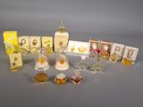 a lot of perfumes and perfume bottles on a table