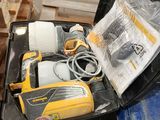 a suitcase with tools in it sitting on a pallet