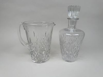pair of cut glass decanters and a decanter
