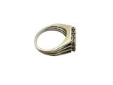 a close up of a ring on a white background