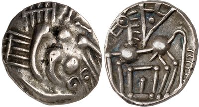 a silver coin with an image of a man on a horse