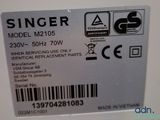 a label on the back of a refrigerator that says singer model m2205