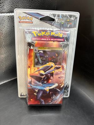 a close up of a box of pokemon cards on a table