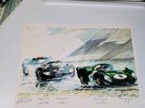 painting of a race car and a racing car on a table