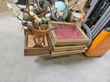 a forklift truck with a bunch of items in it