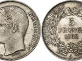 une pièce d'argent représentant la tête d'un homme de profil