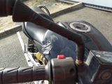 a close up of a motorcycle handle on the handlebars
