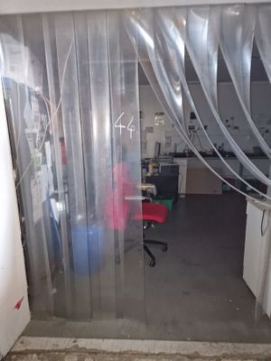 a picture of a room that has a lot of plastic covering it