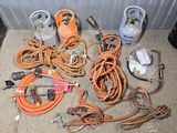 a lot of wires and tools that are on the ground