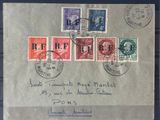 an old postcard with a bunch of stamps on top of it