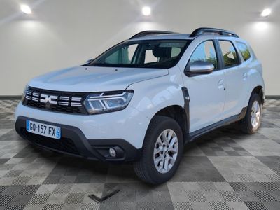 the white dacia is parked on a checkered tile floor
