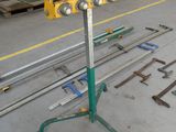 an image of a machine that is working on a piece of metal