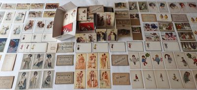a lot of old postcards on the table