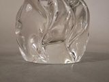 a glass elephant figurine sitting on a table