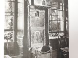 an old photo of a kitchen with a stove and cabinets
