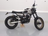 a motorcycle that is parked on a white floor