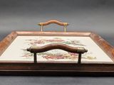 a picture of a wooden box with a handle on it