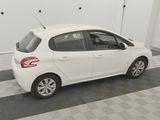 a picture of a white car parked in a garage