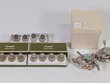 a box of chocolates and a tea set on a table