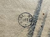 a close up of a piece of paper with a stamp on it