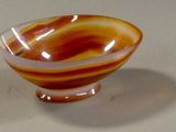 a glass bowl that is sitting on a table