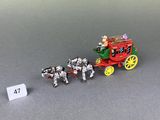 a small model of a horse drawn carriage and a small model of a horse drawn carriage