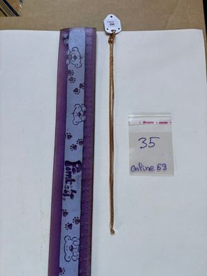 a picture of a pen and a ruler on a table