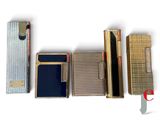 several different types of lighters are lined up on a white surface