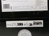 a black box with a label on it that says sharp