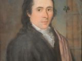 portrait d'un homme vêtu d'un manteau noir et d'une écharpe rose
