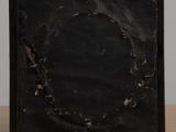a picture of a black square with a hole in it